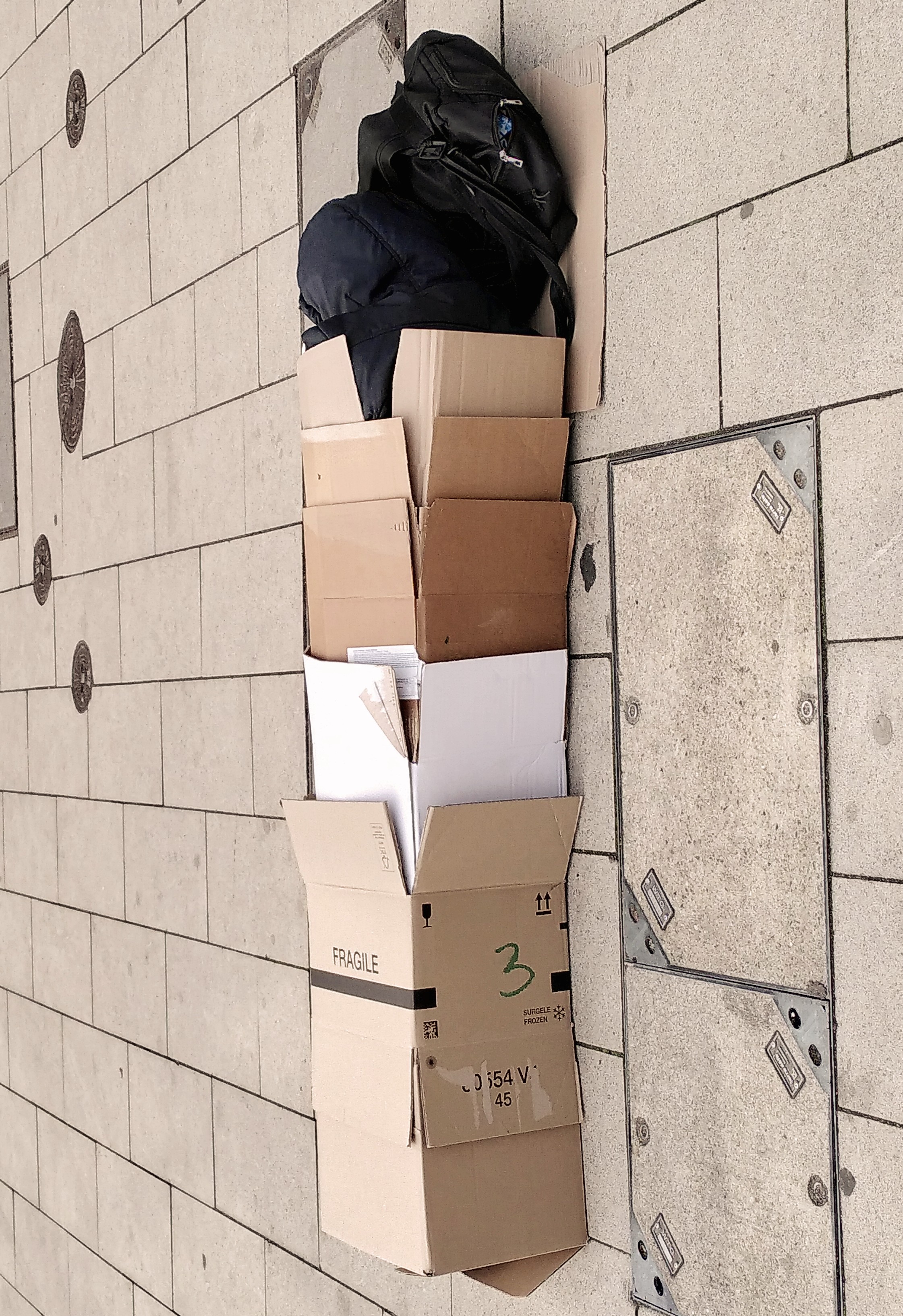 person sleeping on the street, Hamburg, 2025